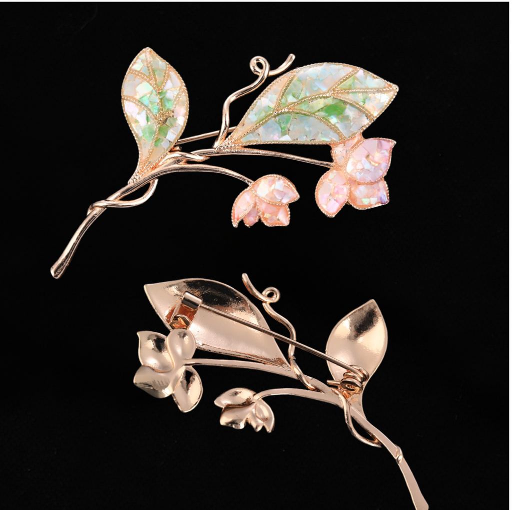 Front and back of mother of pearl,nacre shell brooch＆lily brooch on black