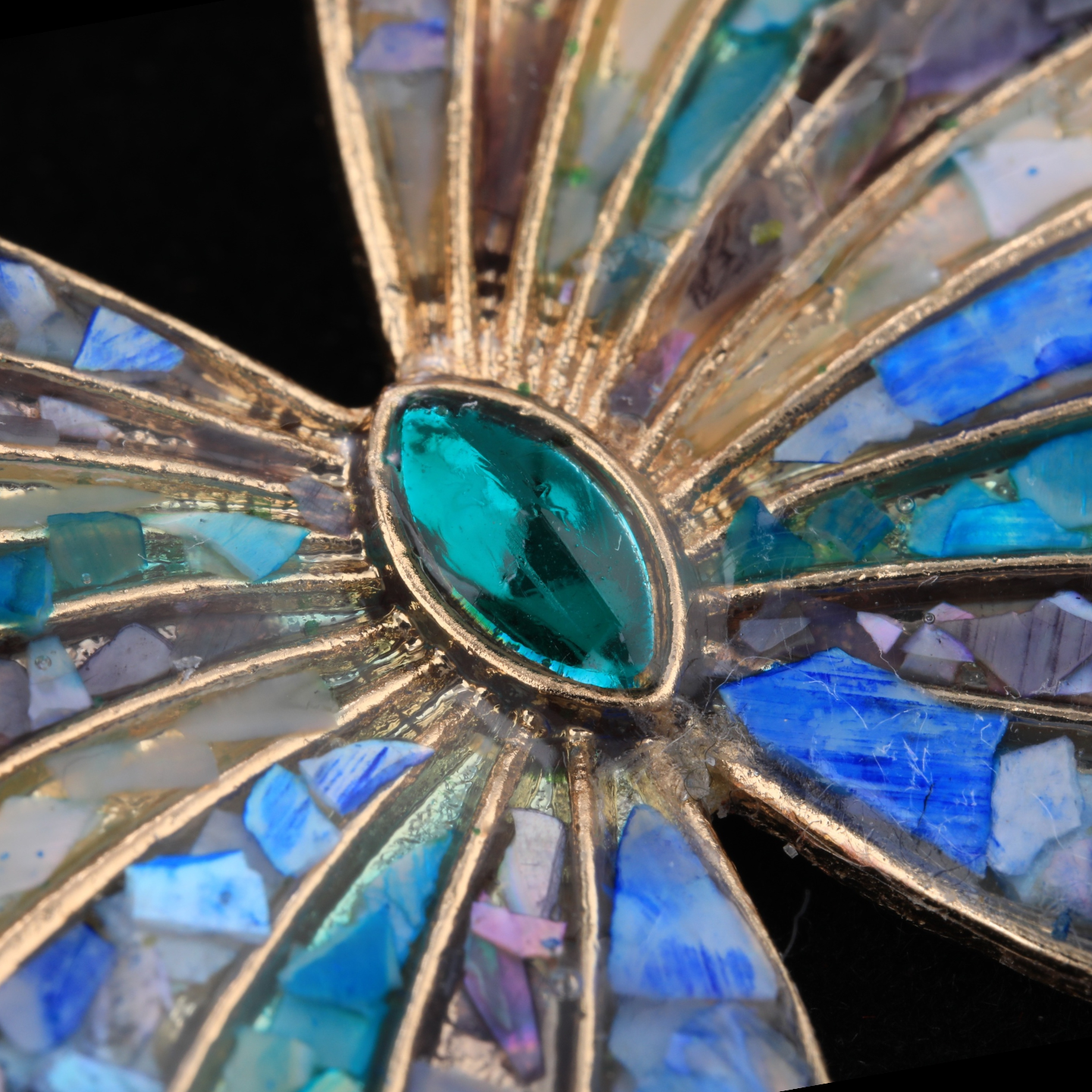 Close up of mother of pearl,nacre shell brooch＆Butterfly brooch with pink-purple wings on black