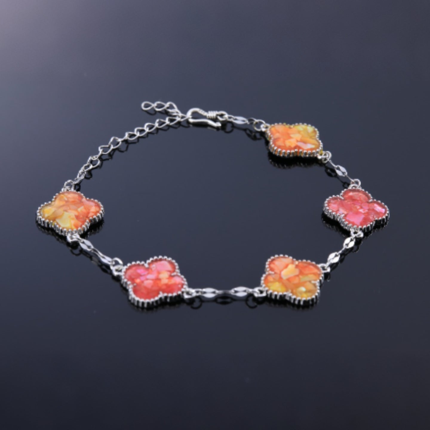  Polished alloy edging around mother of pearl clover charm  