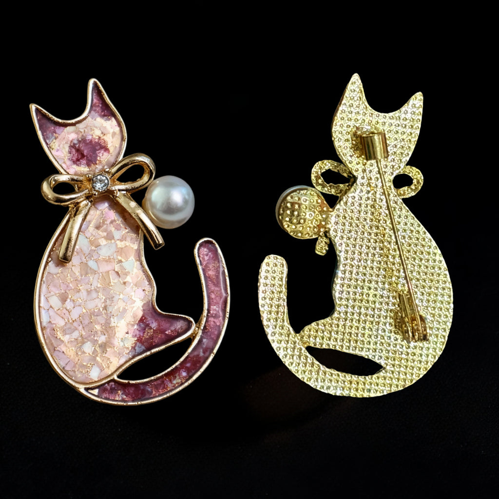 Artisan-made cat brooch with gold alloy base, diamond bow, and freshwater pearl accent