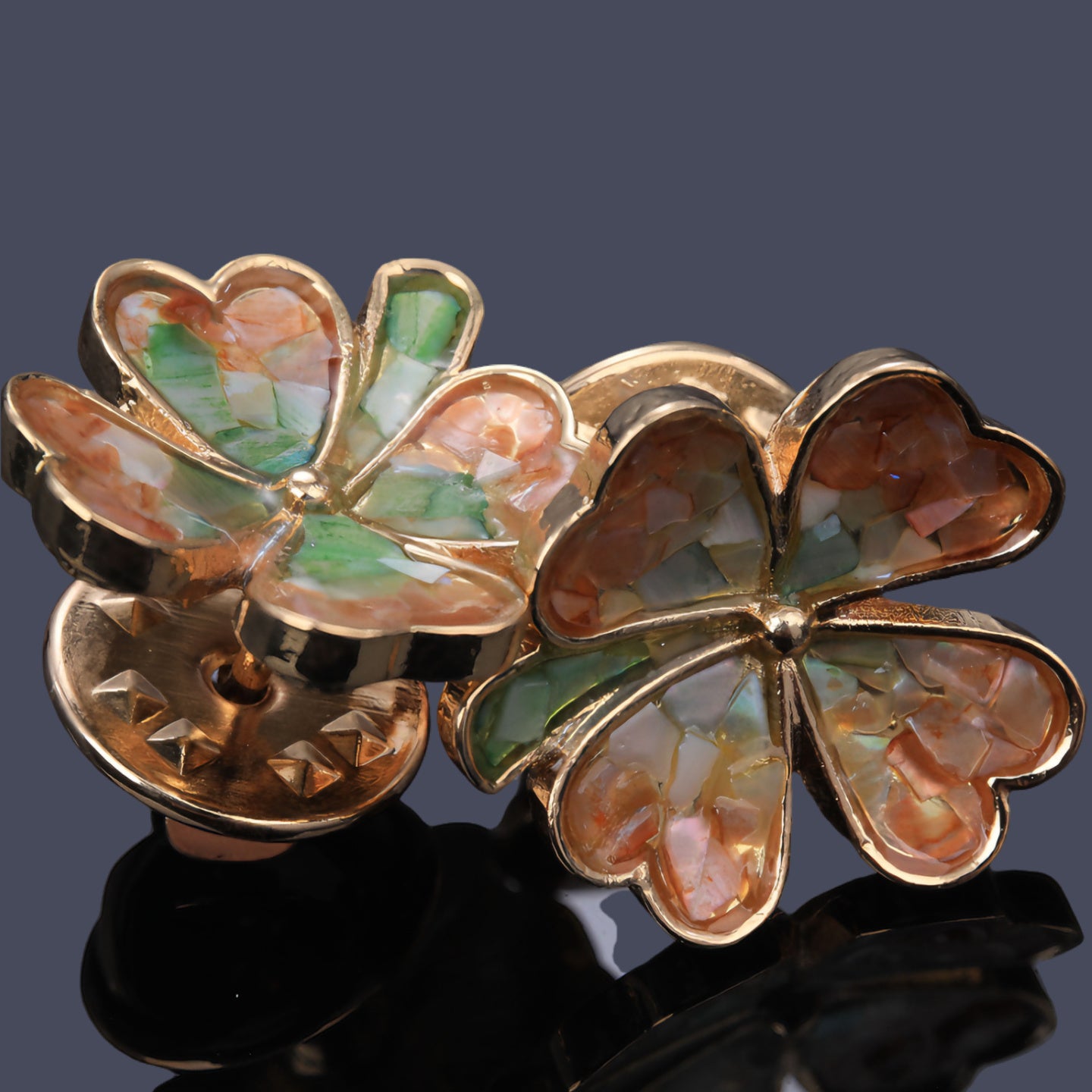 Four-leaf clover cufflinks on white dress shirt cuff  