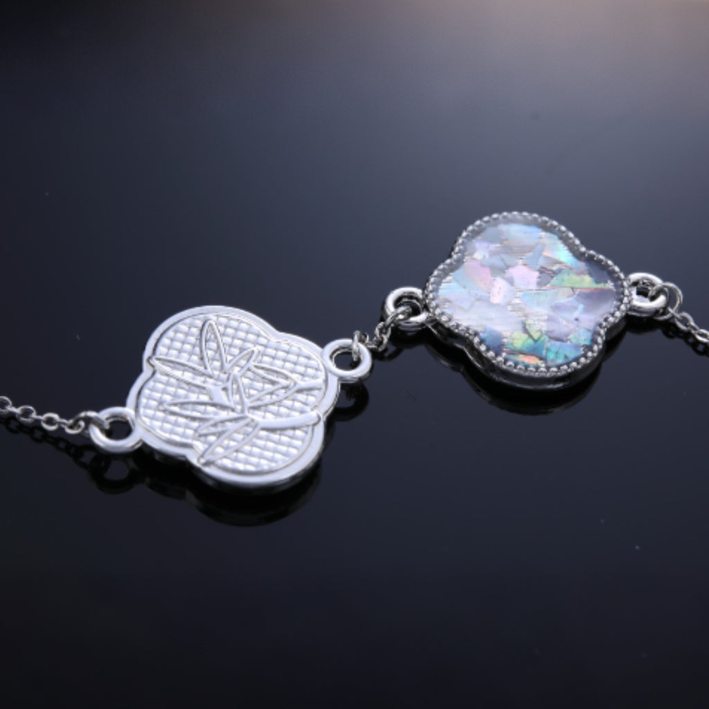 Back view of silver alloy base for double clover mother of pearl bracelet
