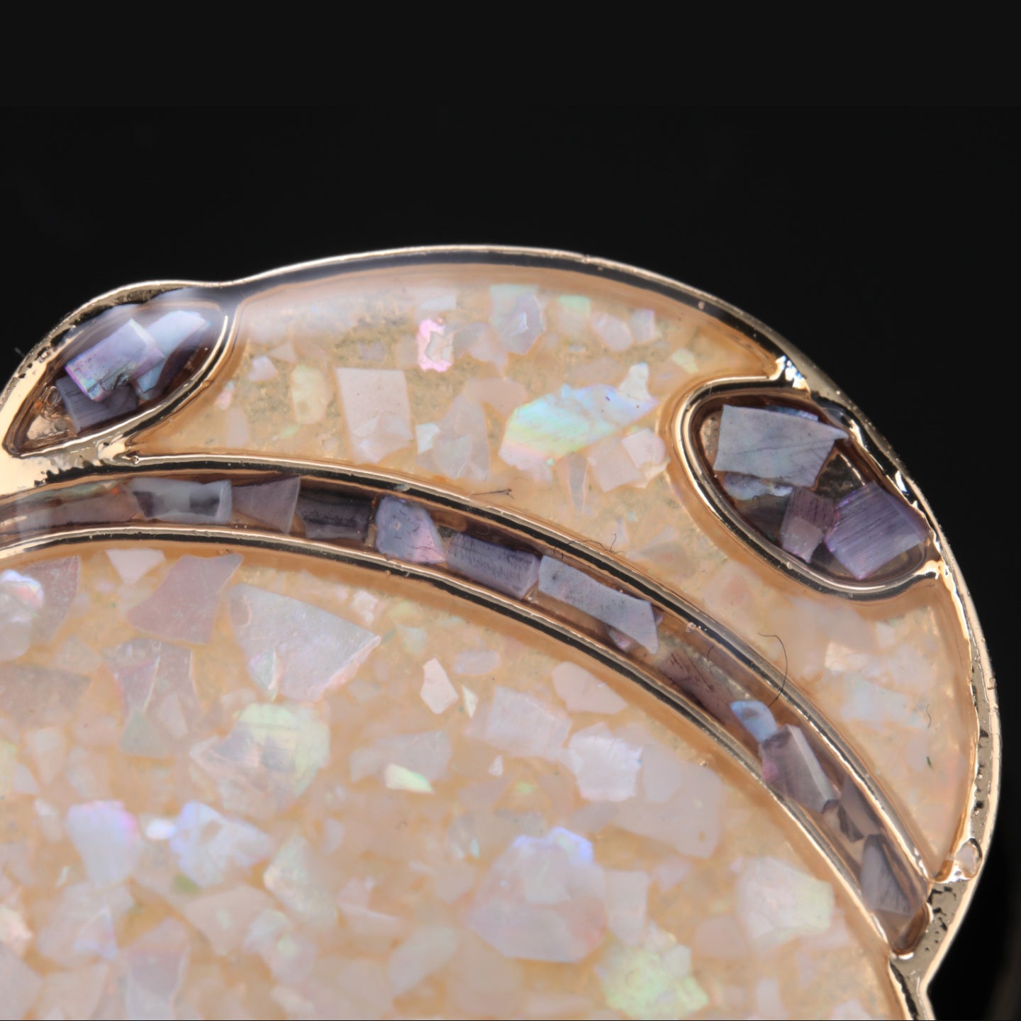 Close-up of mother of pearl,nacre shell brooch＆Panda brooch