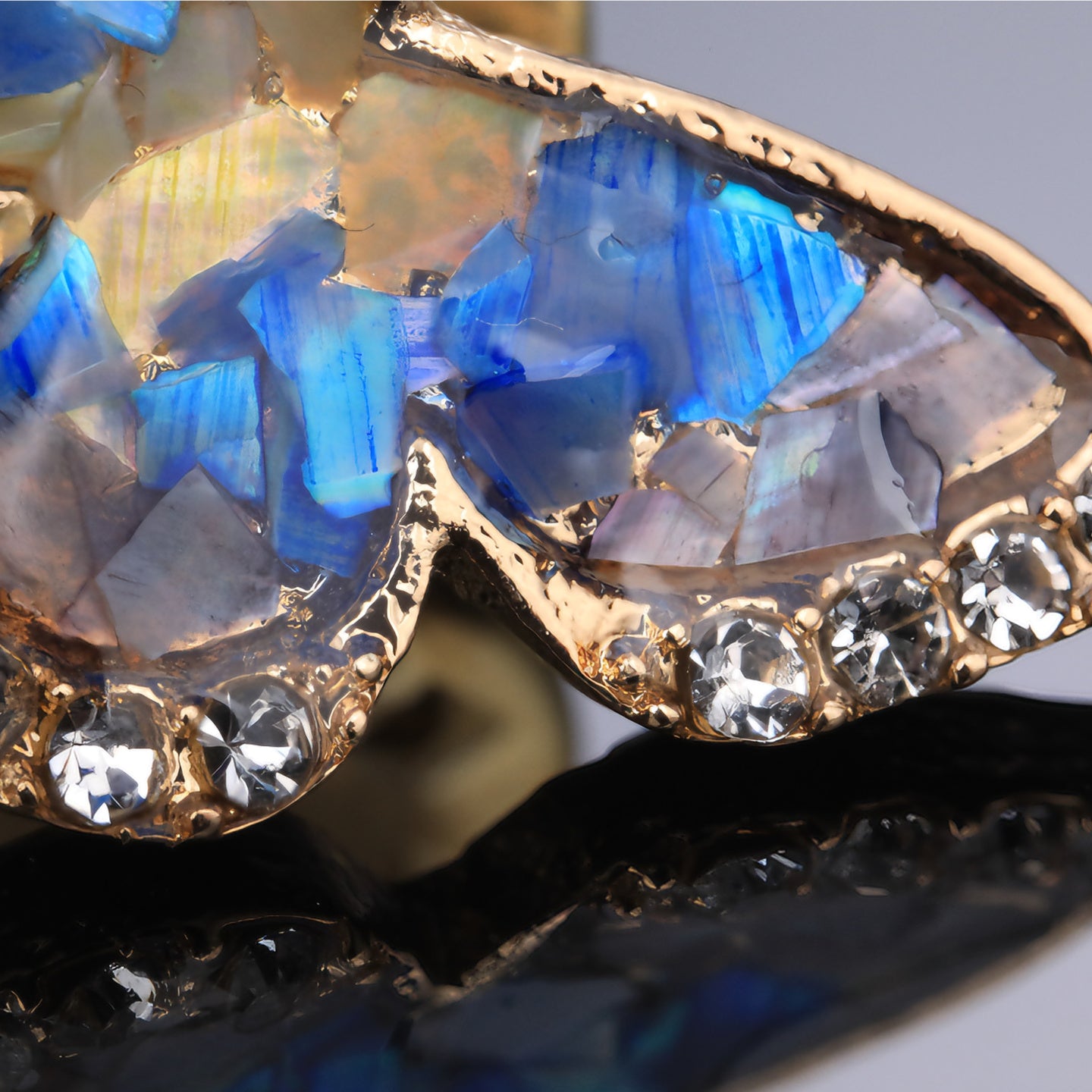 Close up of mother of pearl,nacre shell brooch＆Butterfly brooch with gold-blue wings