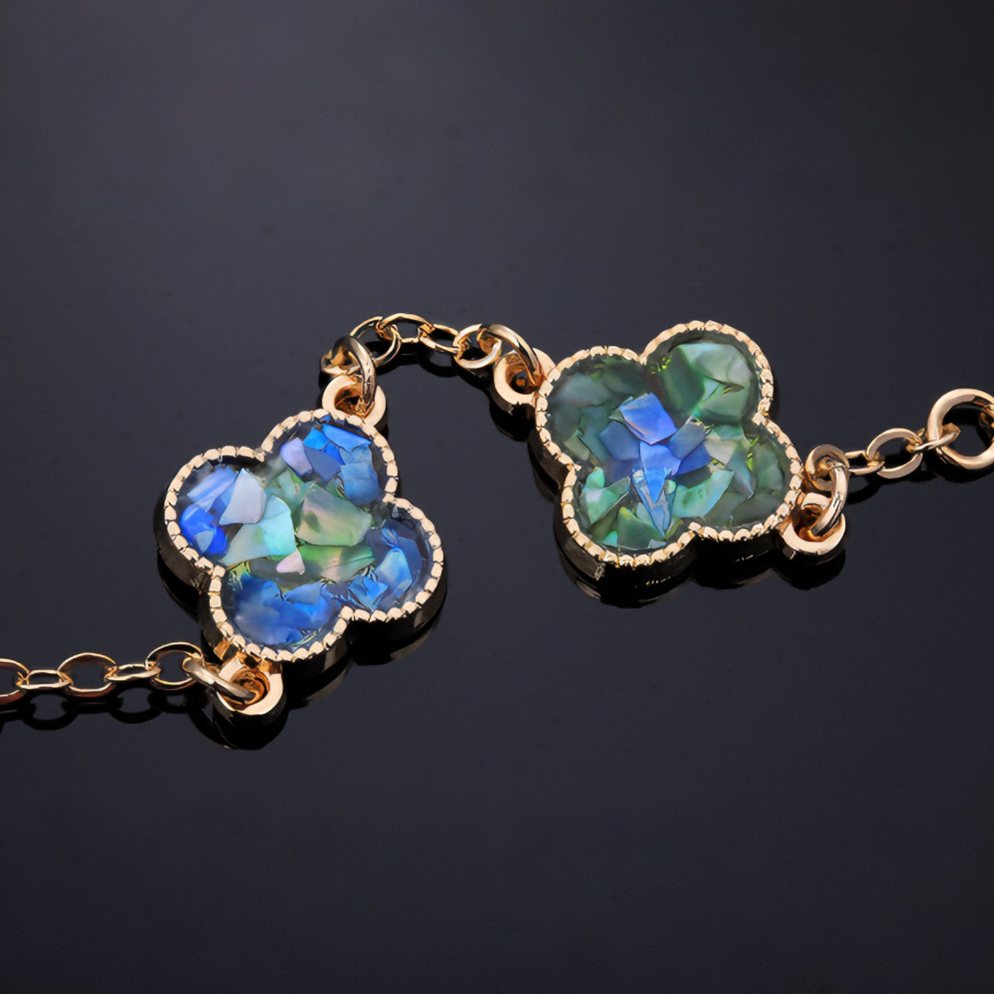 Worn iridescent clover bracelet (everyday luxury accessory)  