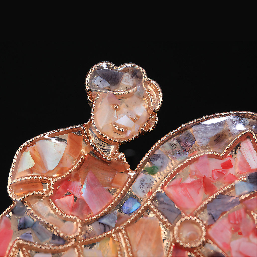 Close up of mother of pearl,nacre shell brooch＆Rocking Horse brooch with rose-red base