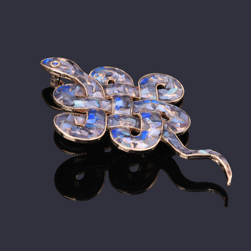  Close-up of mother of pearl,nacre shell brooch＆Double Snake Celtic Knot brooch with blue-purple tone