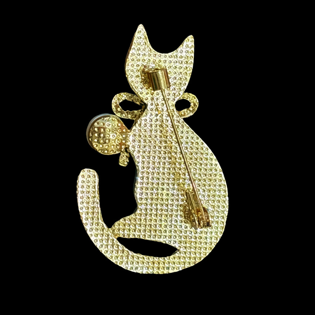 Back of mother of pearl cat, nacre shell brooch with the secure pin