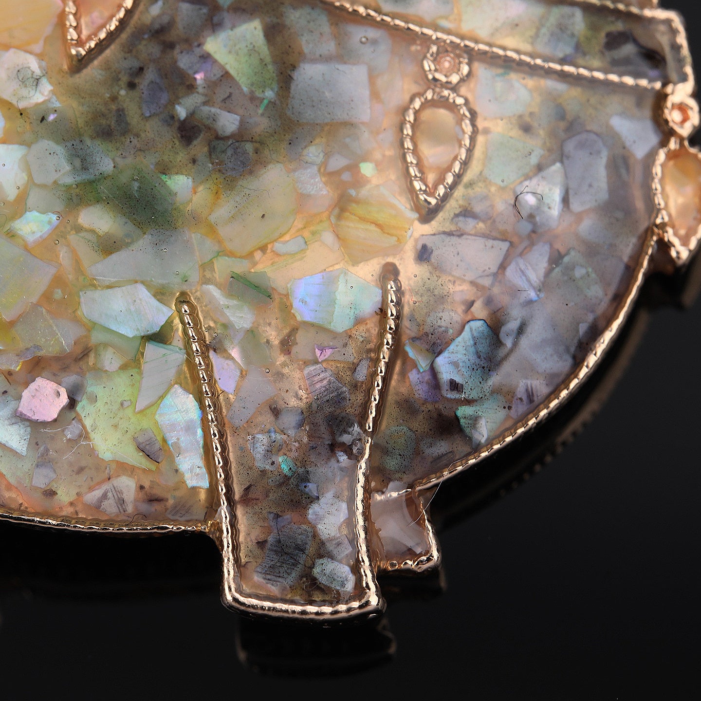 Close up of mother of pearl,nacre shell brooch＆Lucky Horse brooch