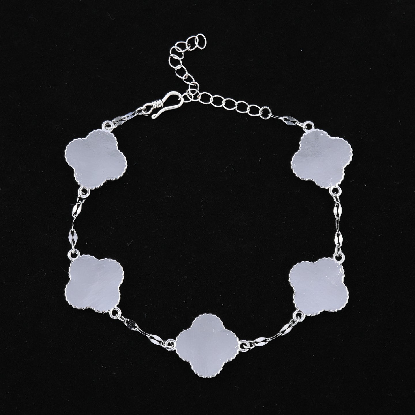 Back side of clover mother of pearl bracelet showing alloy base